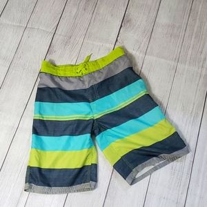 Multi colored striped swim trunks for boys with pocket in the back